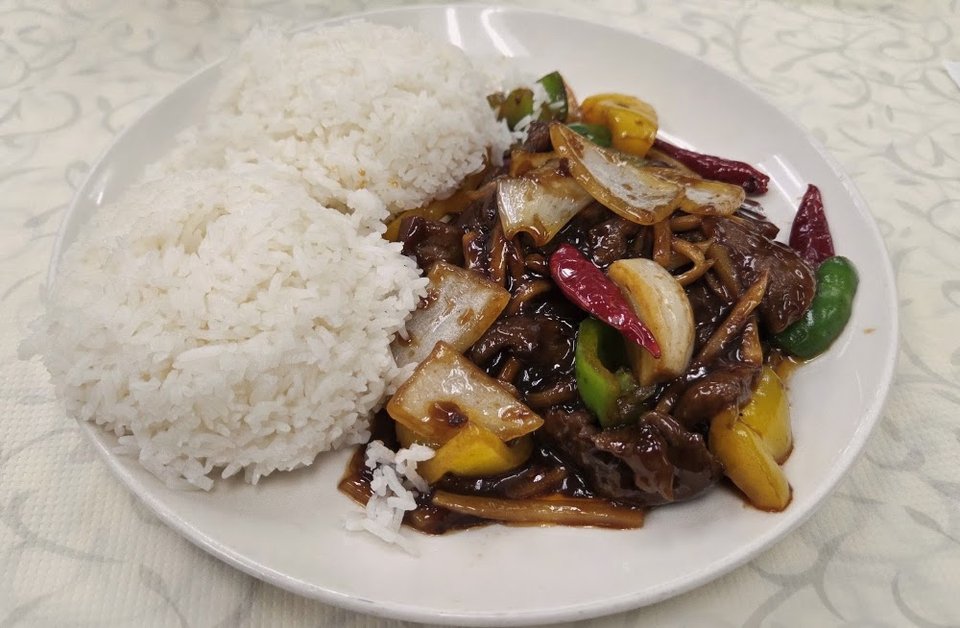 Restaurant menu with fried rice and chow mein.